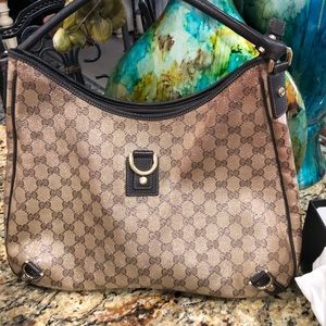 Gucci Crystal GG Praha printed bag.